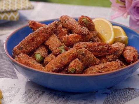 <!-- wp:column -->
<div class="wp-block-column"></div>
<!-- /wp:column -->




















Air-fried frozen okra served in four styles—classic with salt, black pepper, and garlic powder, southern-style with Cajun seasoning, smoked paprika, and cayenne, a light version with lemon juice and fresh parsley, and breaded okra topped with Parmesan alongside ranch dip—displayed on a rustic wooden table.
