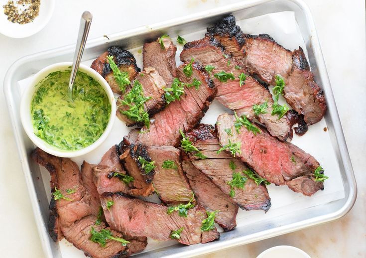 Raw chuck steak on a cutting board, ready for oven cooking, highlighting its marbling and rich texture ideal for slow roasting or braising.