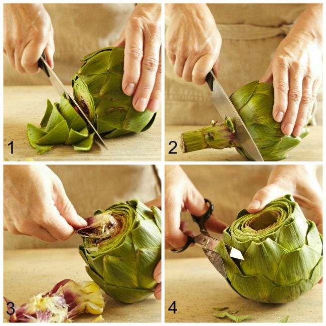Hands trimming fresh artichokes and placing them into an electric pressure cooker with a steaming rack and water at the bottom, showing step-by-step preparation before cooking.