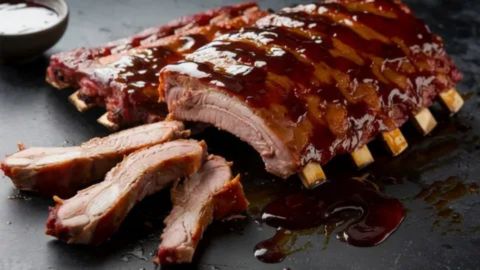 Tender, juicy beef ribs cooked in an air fryer, including back ribs, short ribs, and boneless ribs, with golden-brown caramelized seasoning.